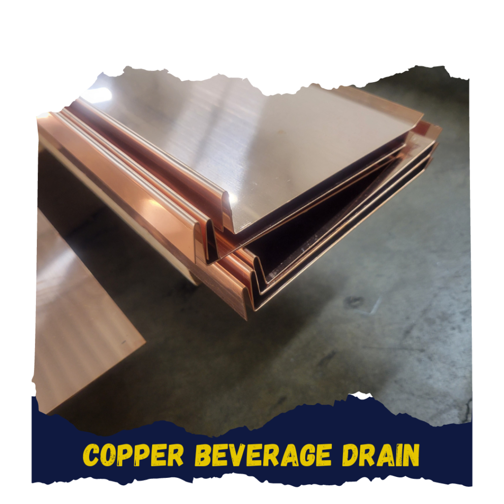 A copper drink drain for the interior of a bar.