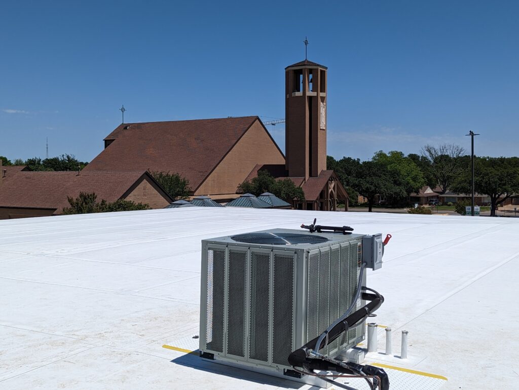 A TPO roof overlooking a church