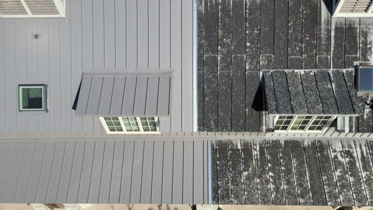 New standing seam panels next to old standing seam panels